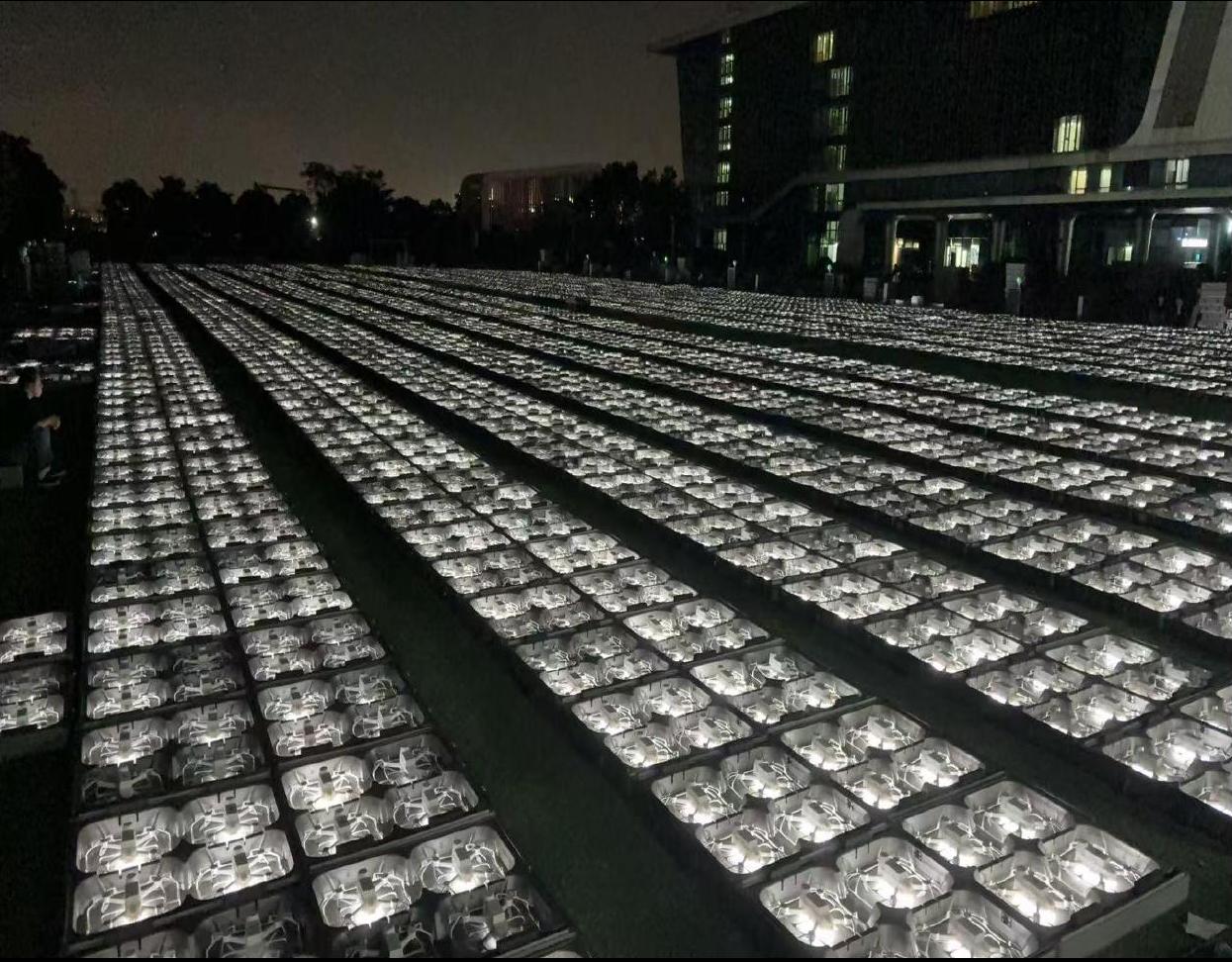 Stadium-scale drone deployment at night