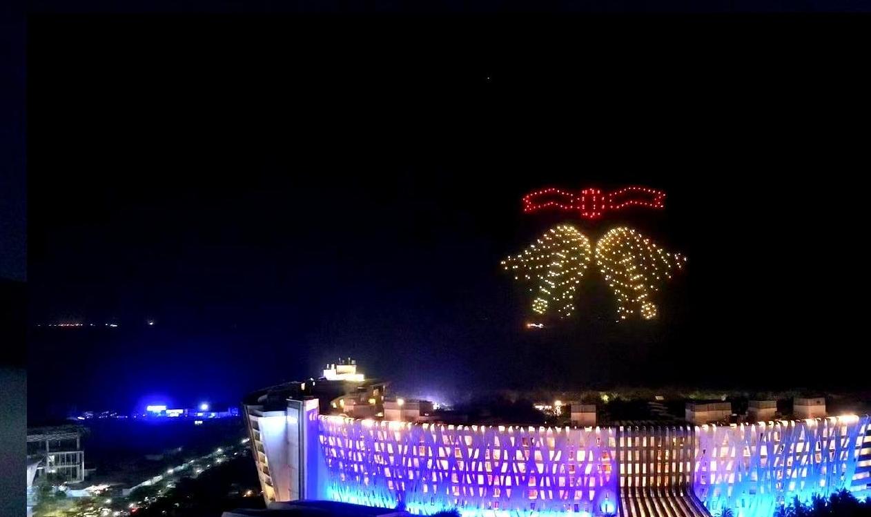 Drone light show formation over the Westin hotel